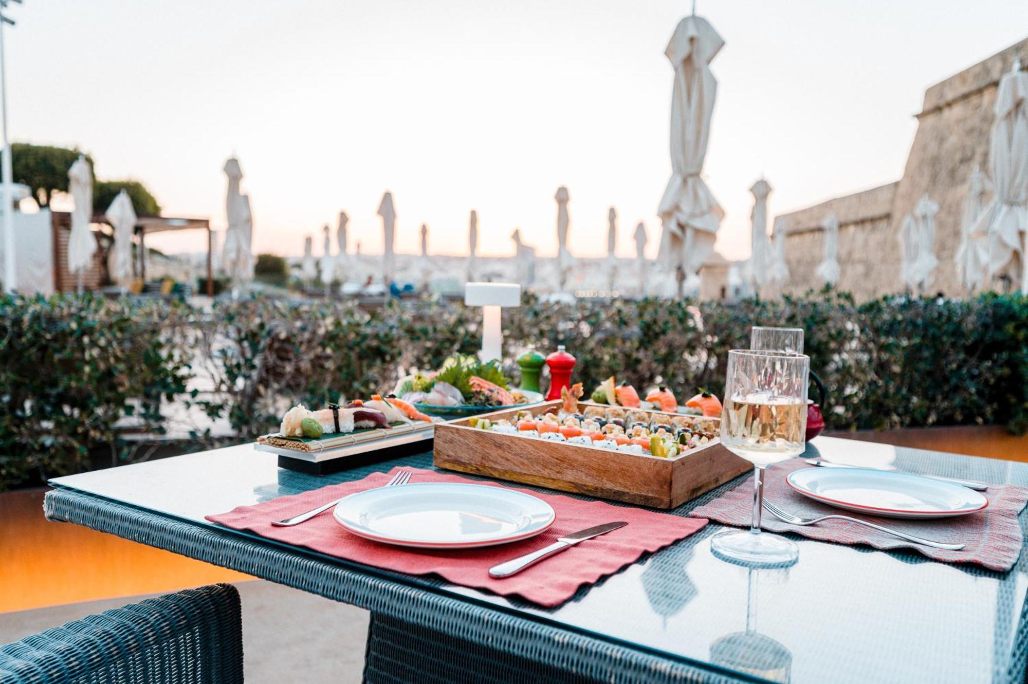 The Phoenicia Malta Floriana Exterior photo A table set for dinner